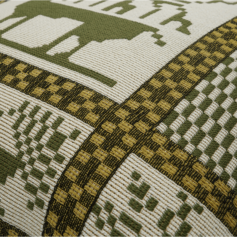 Detail of green manitoba cushion Jules Pansu - jacquard textile, mountain, winter, rendeer